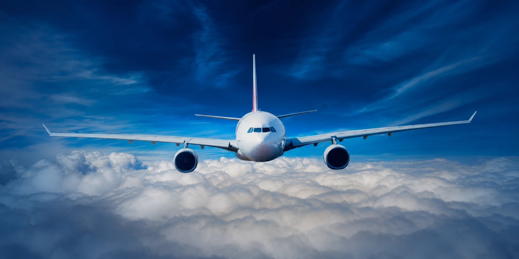 Aircraft flying above the clouds